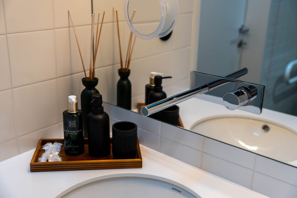 Exclusive Double Room | Bathroom | Designer toiletries, hair dryer, bathrobes, slippers