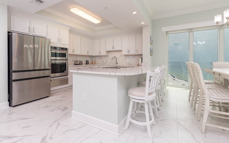 Condo, 4 Bedrooms | Private kitchen | Coffee/tea maker, fridge, oven