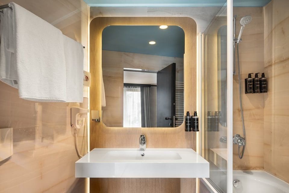 Eco-friendly toiletries, hair dryer, towels
