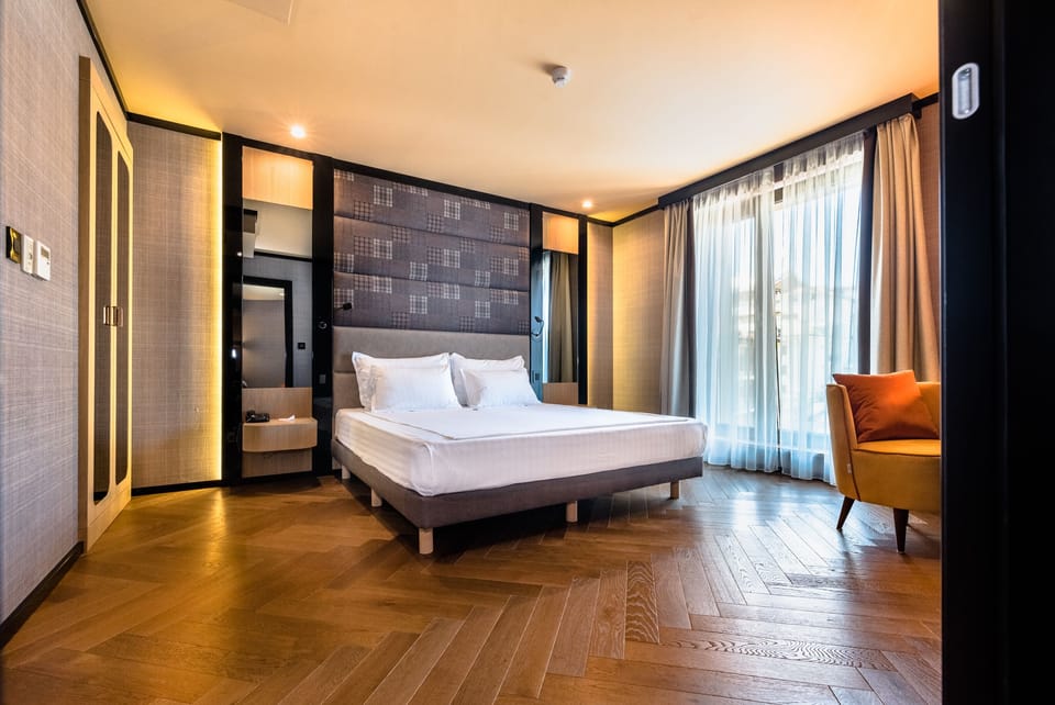 Premium bedding, down comforters, memory foam beds, minibar