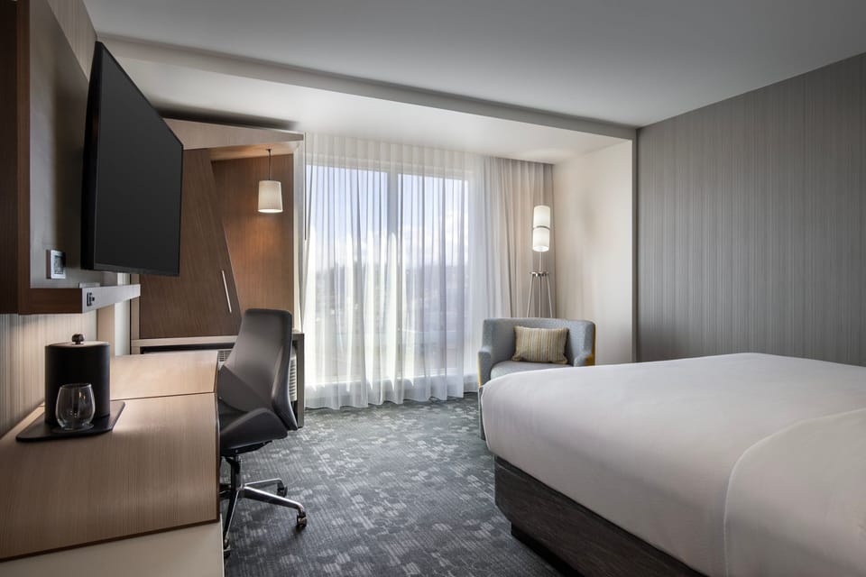 Pillowtop beds, desk, laptop workspace, blackout drapes