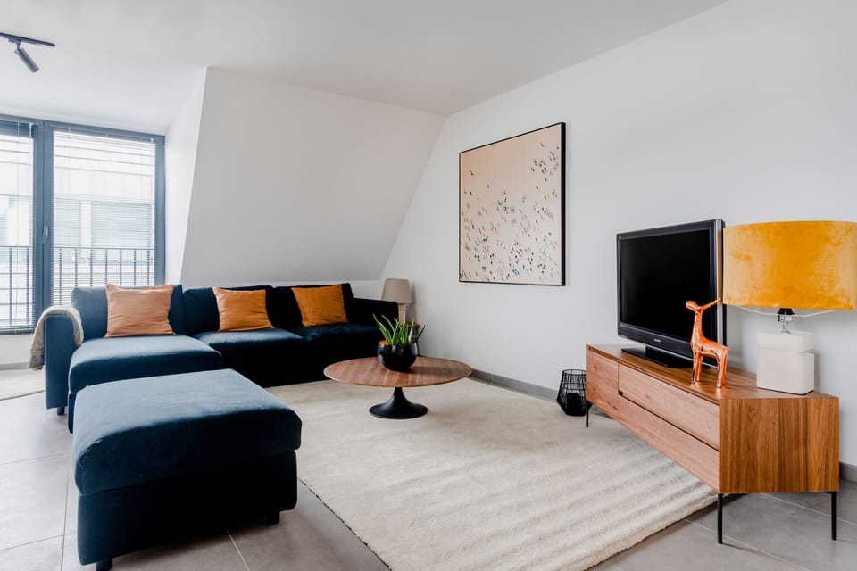 Comfort Apartment | Living area | 85-inch flat-screen TV with cable channels, TV