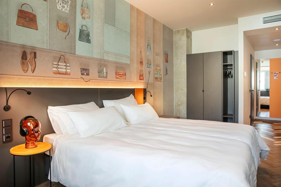 Hypo-allergenic bedding, desk, blackout drapes, soundproofing
