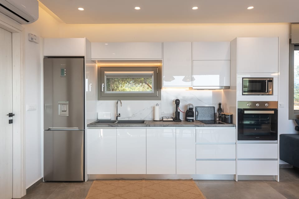 Panoramic Villa, 2 Bedrooms, Private Pool, Ground Floor | Private kitchen | Full-size fridge, microwave, oven, stovetop