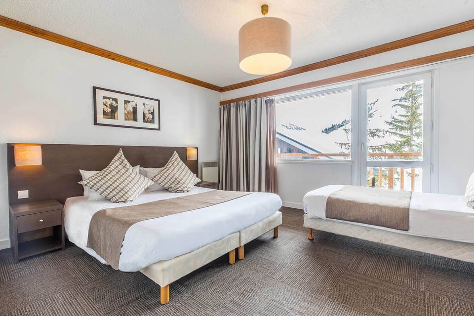 Comfort Triple Room | Premium bedding, in-room safe, free WiFi, bed sheets