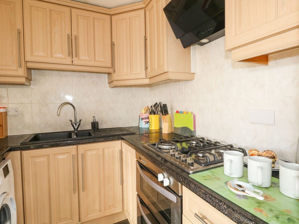 Fridge, electric kettle, toaster, cookware/dishes/utensils