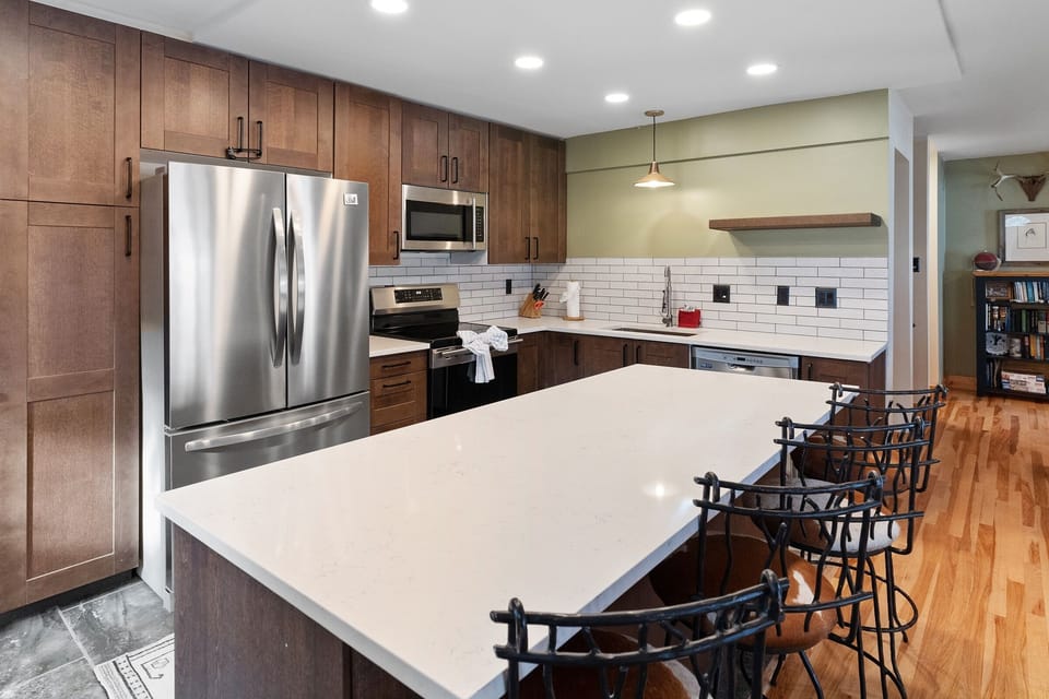 Condo, 4 Bedrooms | Private kitchen | Fridge, oven, coffee/tea maker, toaster