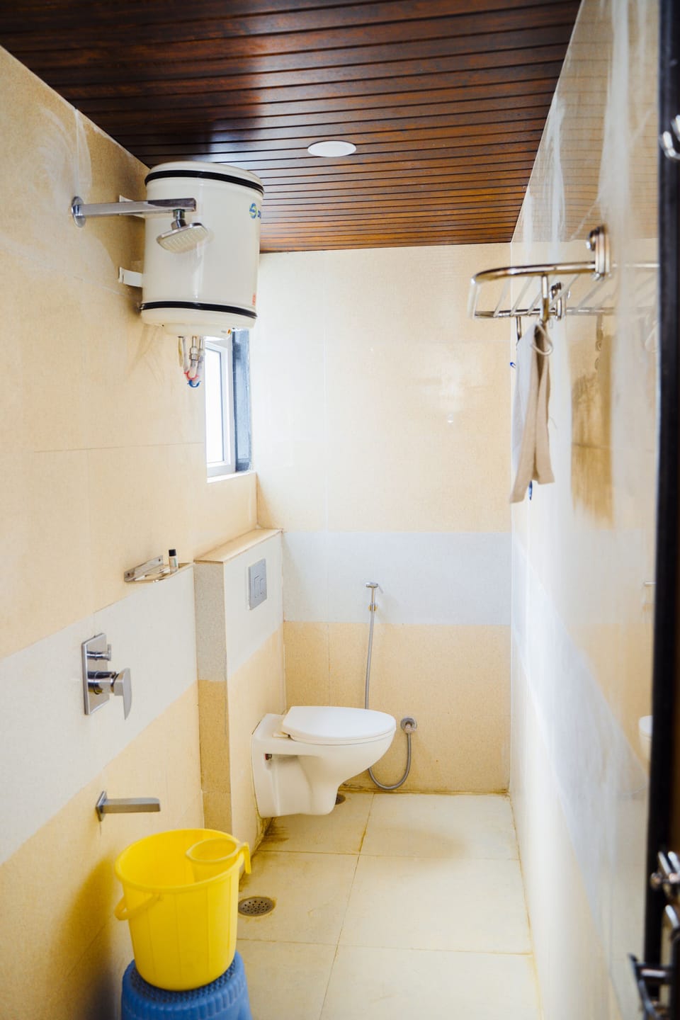 Shower, rainfall showerhead, designer toiletries, towels