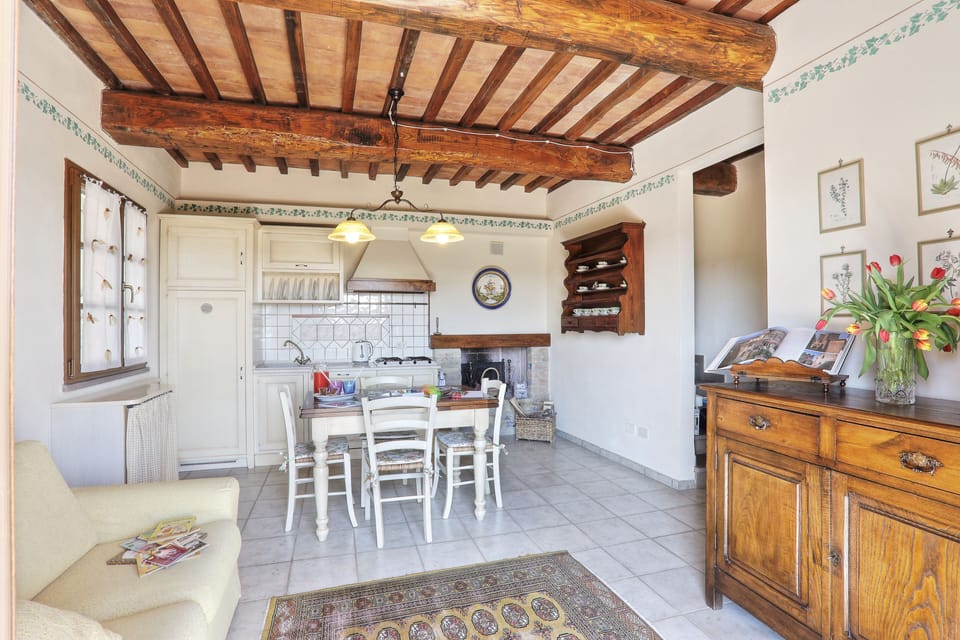 Romantic Villa | Living area | 32-inch flat-screen TV with cable channels, TV, fireplace