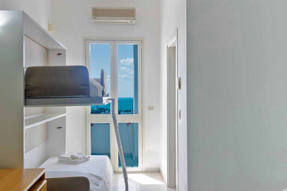 Panoramic Quadruple Room | Beach/ocean view