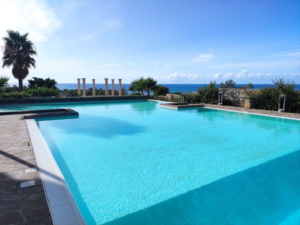 Seasonal outdoor pool, pool umbrellas, sun loungers