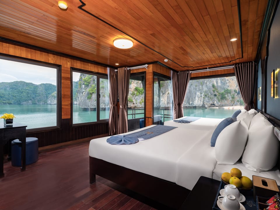Deluxe Quadruple Cabin with Ocean View | Pillowtop beds, in-room safe, desk, blackout drapes