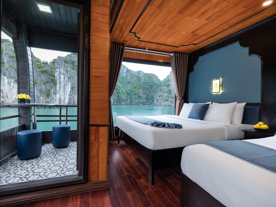 Deluxe Quadruple Cabin with Ocean View | Pillowtop beds, in-room safe, desk, blackout drapes
