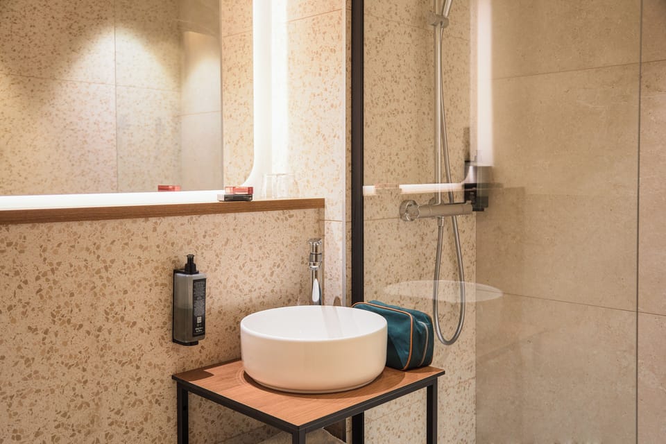 Eco-friendly toiletries, hair dryer, towels