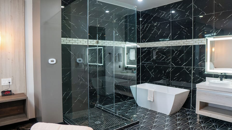 Desk, laptop workspace, blackout drapes, iron/ironing board