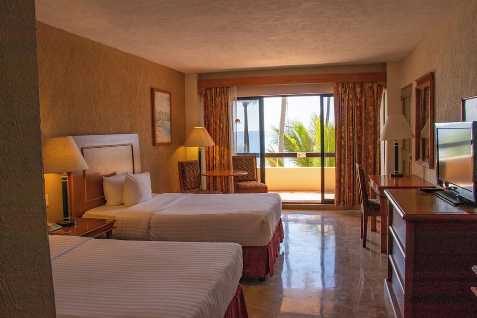 Standard Room, 2 Double Beds, Ocean View | Premium bedding, in-room safe, desk, laptop workspace