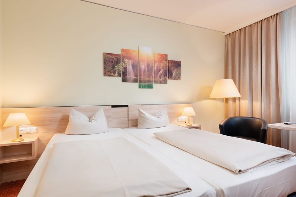Hypo-allergenic bedding, desk, blackout drapes, soundproofing