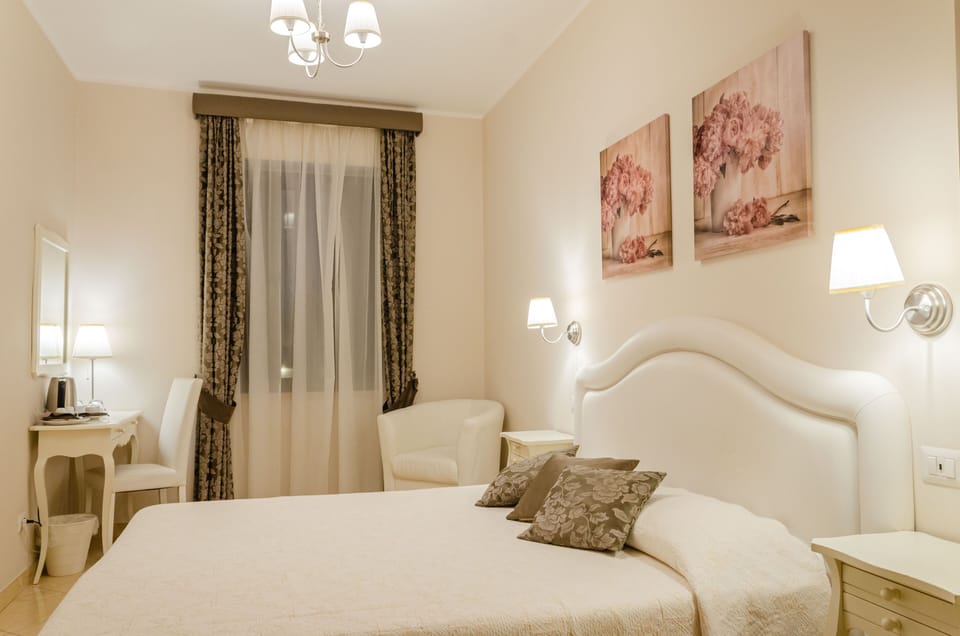 Standard Double or Twin Room | Minibar, in-room safe, desk, laptop workspace