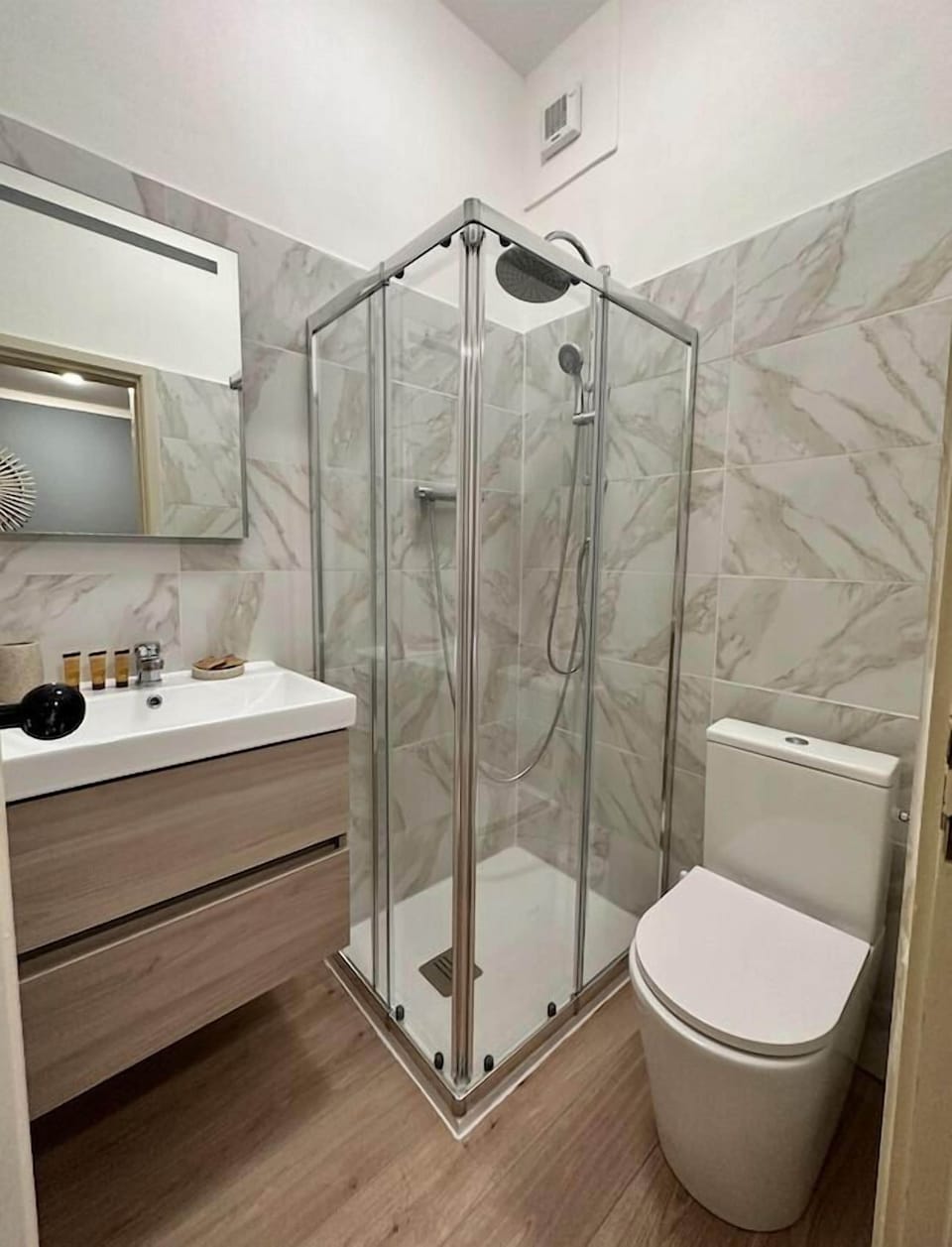 Basic Studio | Bathroom | Shower, hair dryer, towels