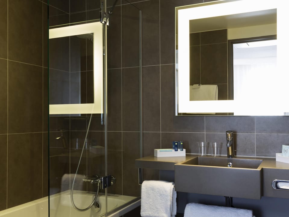Eco-friendly toiletries, hair dryer, towels, soap