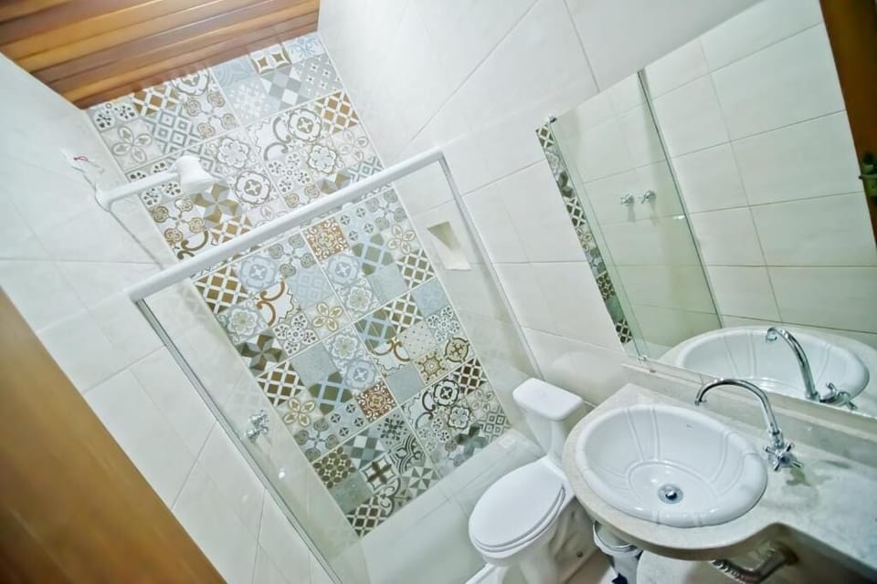 Shower, rainfall showerhead, towels, soap