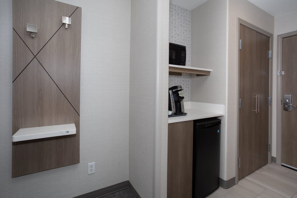 Hypo-allergenic bedding, desk, blackout drapes, iron/ironing board