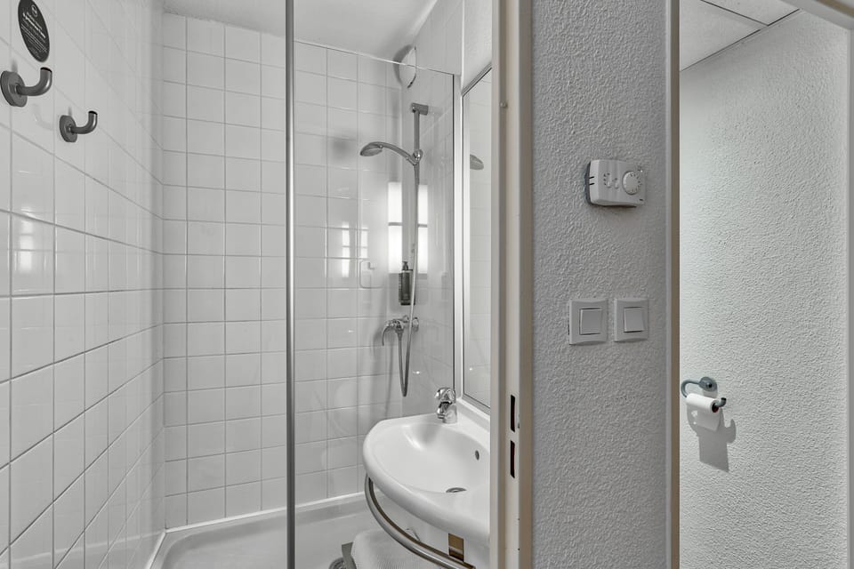 Shower, towels, soap, shampoo