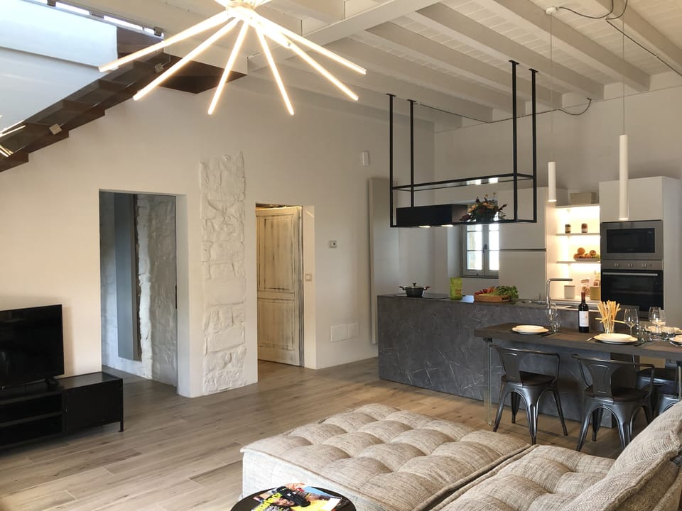 Luxury Apartment | Living area | Flat-screen TV