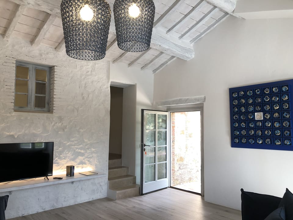 Luxury Apartment | Living area | Flat-screen TV
