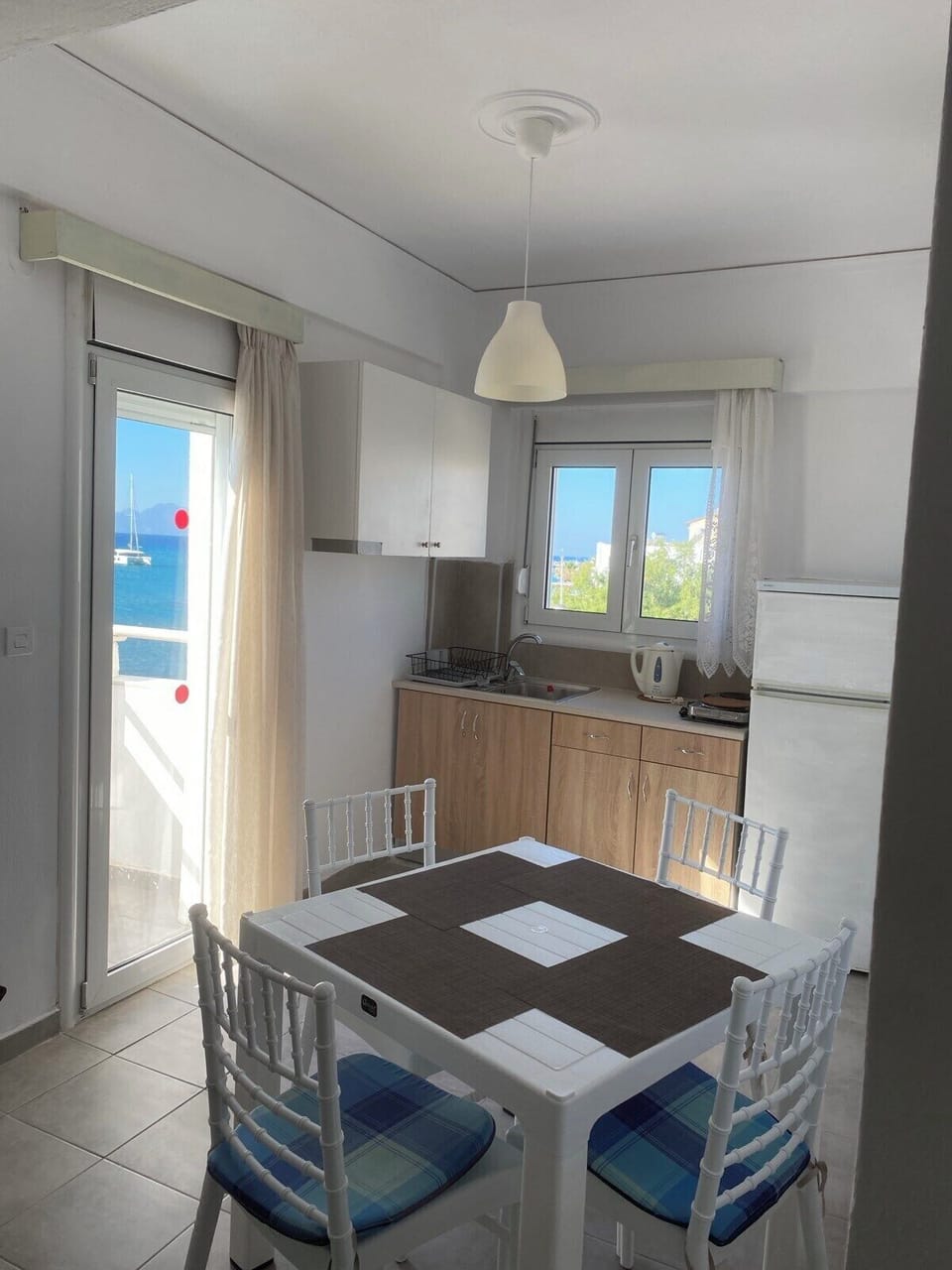 Apartment, 1 Bedroom | Private kitchen | Fridge, stovetop, coffee/tea maker, electric kettle