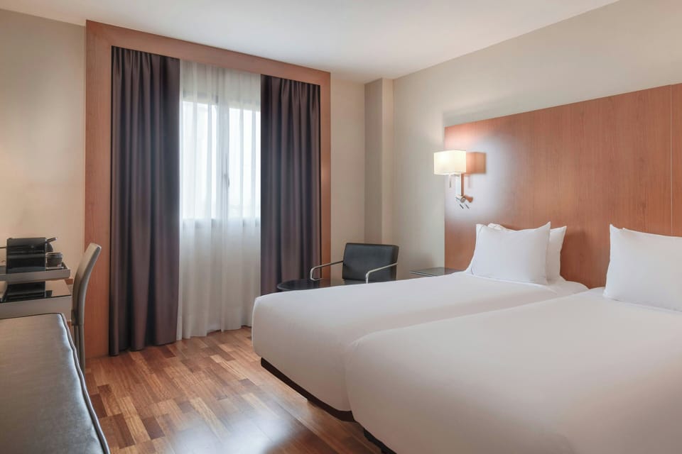 Standard Room, 2 Twin Beds | Minibar, in-room safe, desk, blackout drapes