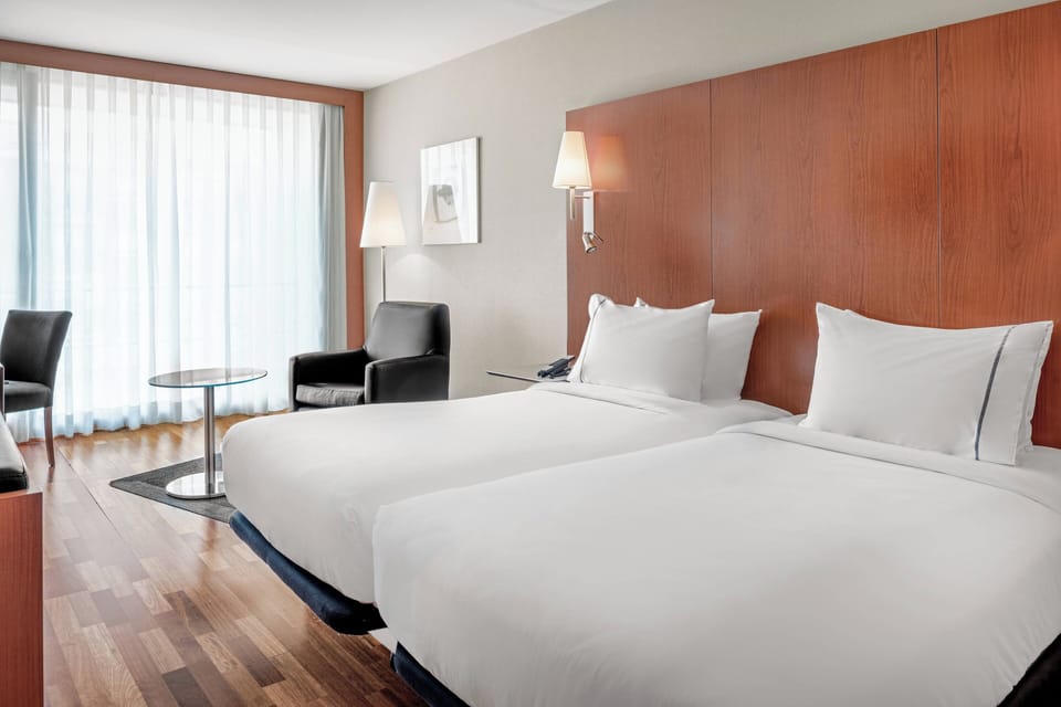 Standard Room, 2 Twin Beds | Minibar, in-room safe, desk, blackout drapes