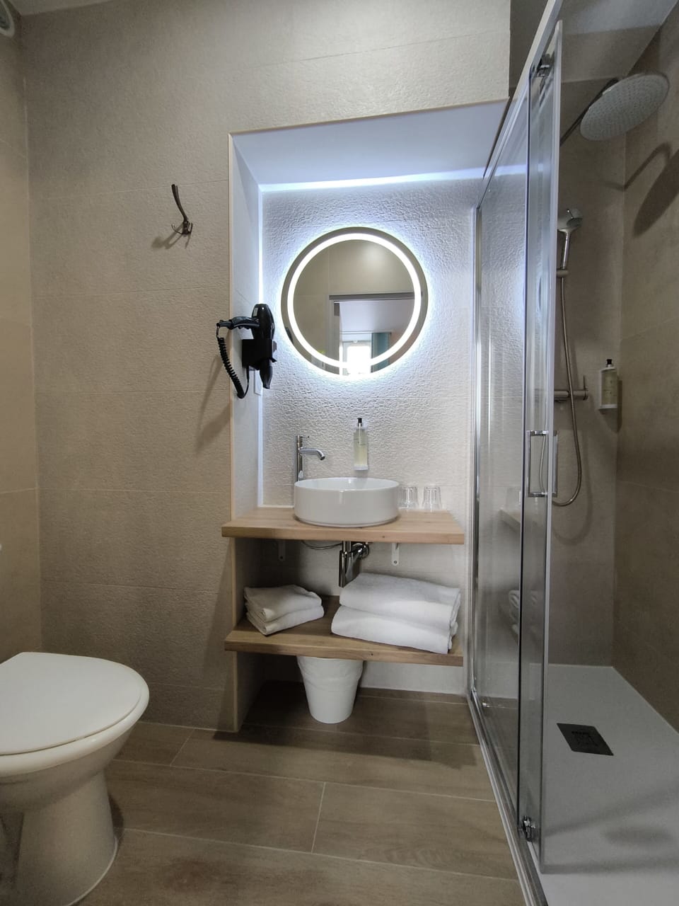 Shower, free toiletries, hair dryer, towels