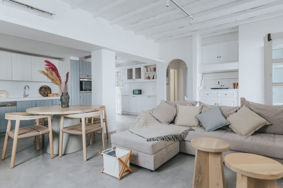 Deluxe Beach Front Villa, With Pool | Living area | 43-inch Smart TV with satellite channels, TV, fireplace