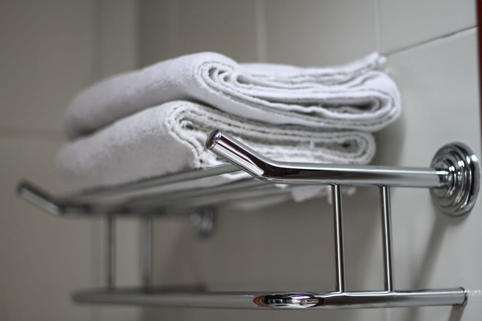 Deluxe Loft, 2 Bedrooms | Bathroom | Free toiletries, hair dryer (on request), towels, soap