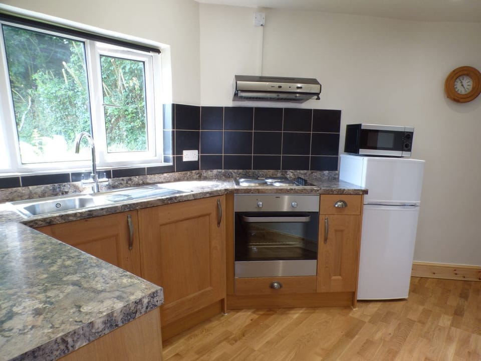 Fridge, electric kettle, toaster, cookware/dishes/utensils