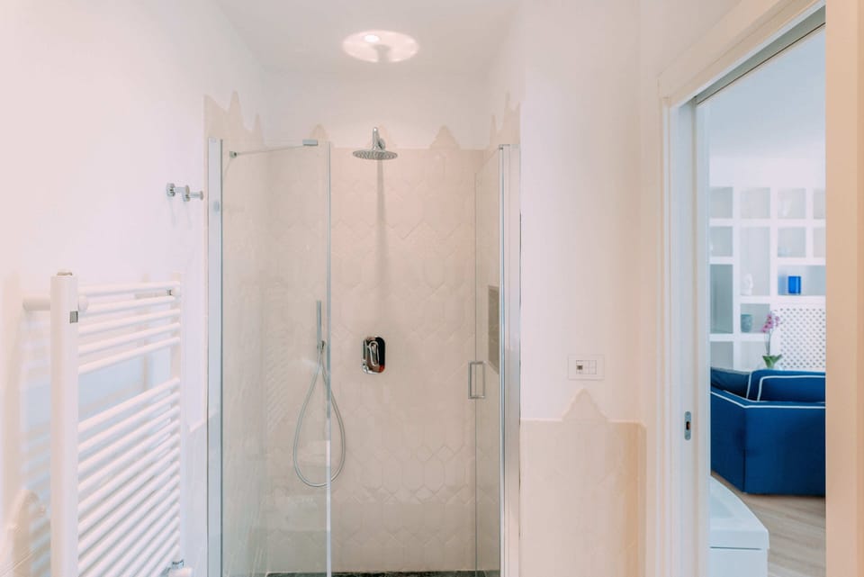 Exclusive Studio Suite | Bathroom | Separate tub and shower, jetted tub, hair dryer, bidet