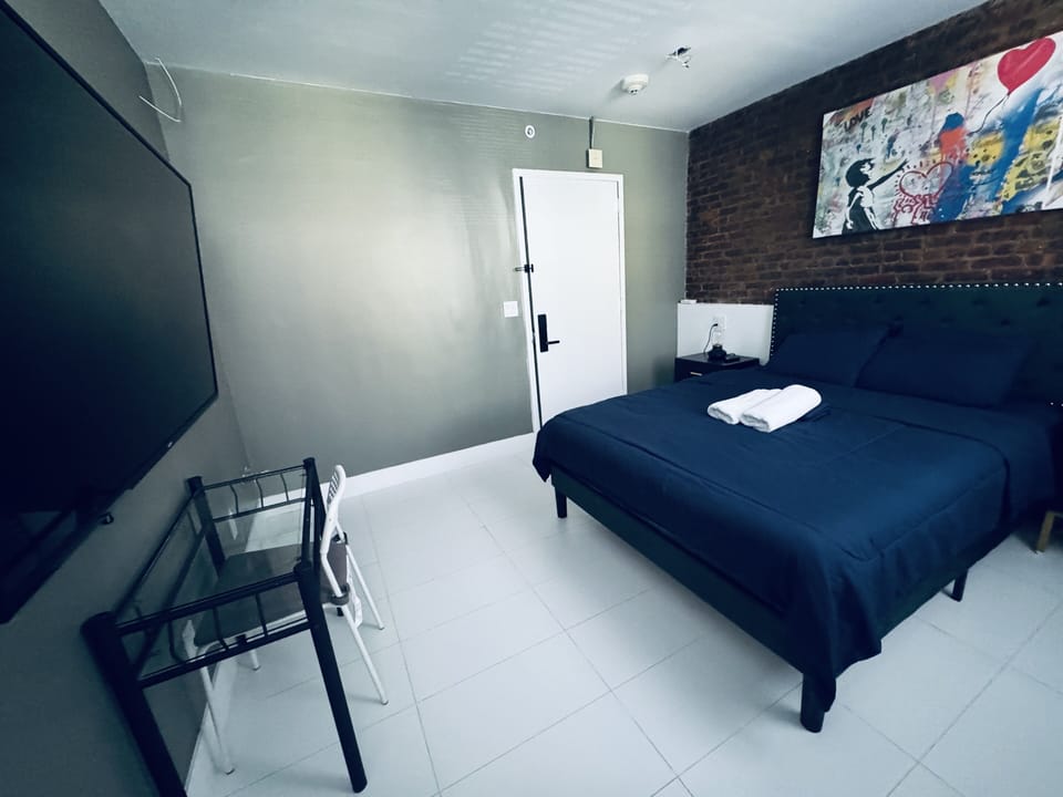 Deluxe Double Room (2 Adults + 1 Child) | Bathroom | Hair dryer, towels