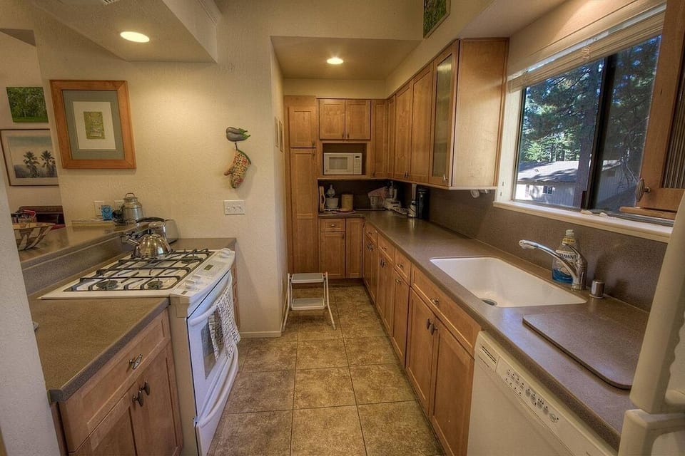Condo, 3 Bedrooms | Private kitchen | Fridge, coffee/tea maker, toaster