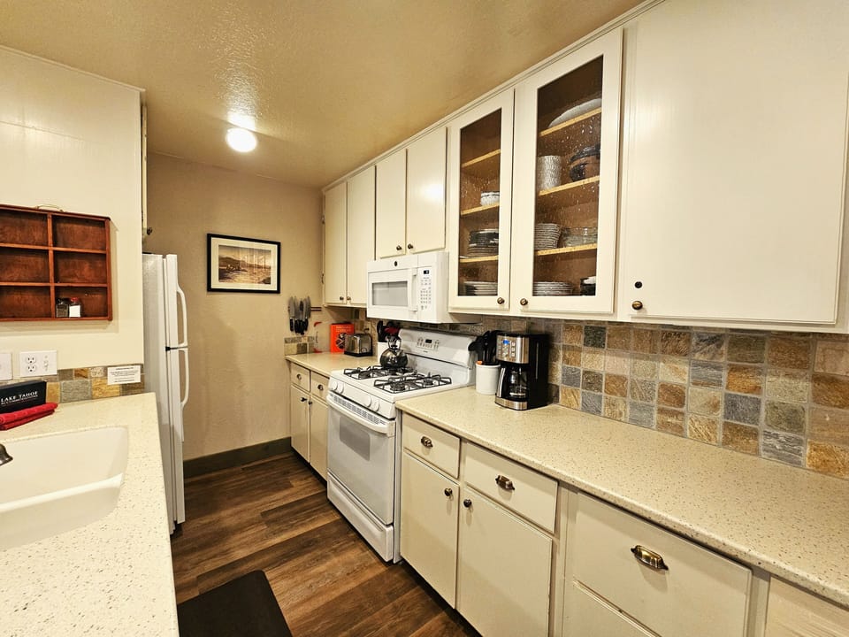 Condo, 3 Bedrooms | Private kitchen | Fridge, coffee/tea maker, toaster