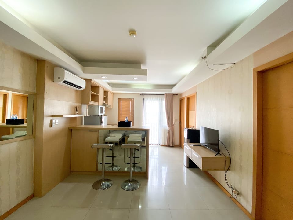 Deluxe Apartment, 2 Bedrooms | Private kitchen | Full-size fridge, stovetop