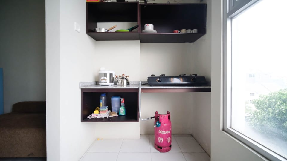 Deluxe Apartment, 2 Bedrooms | Private kitchen | Full-size fridge, stovetop, electric kettle