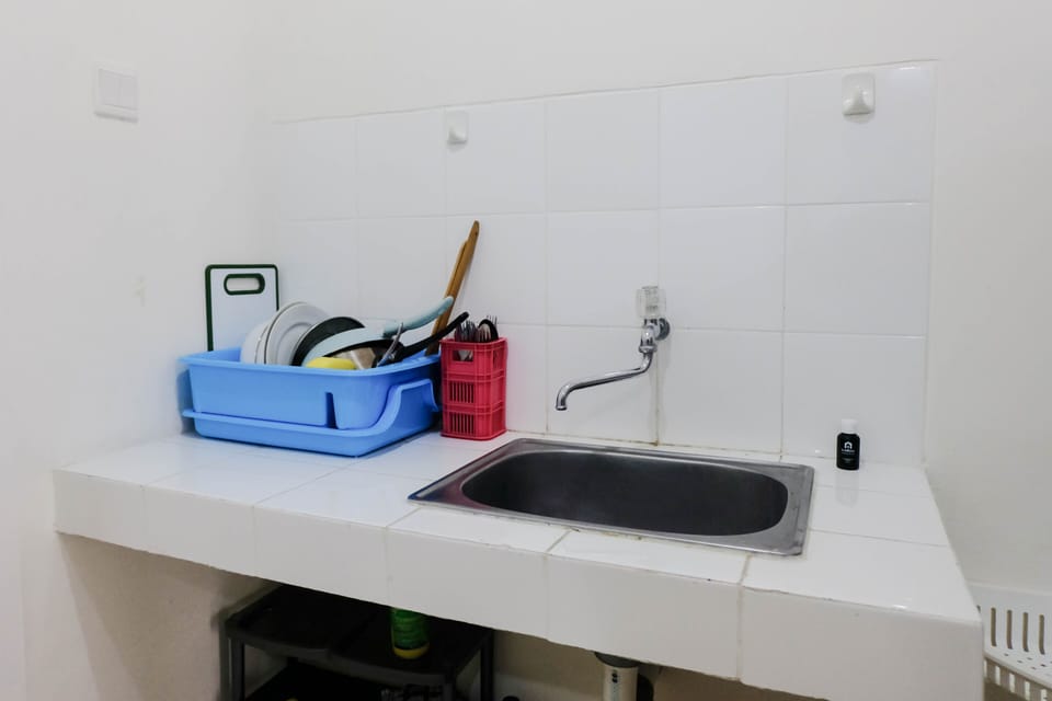 Deluxe Apartment, 1 Bedroom | Private kitchen | Full-size fridge, stovetop