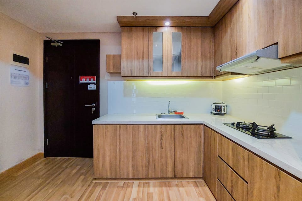 Deluxe Apartment, 1 Bedroom | Private kitchen | Full-size fridge, stovetop