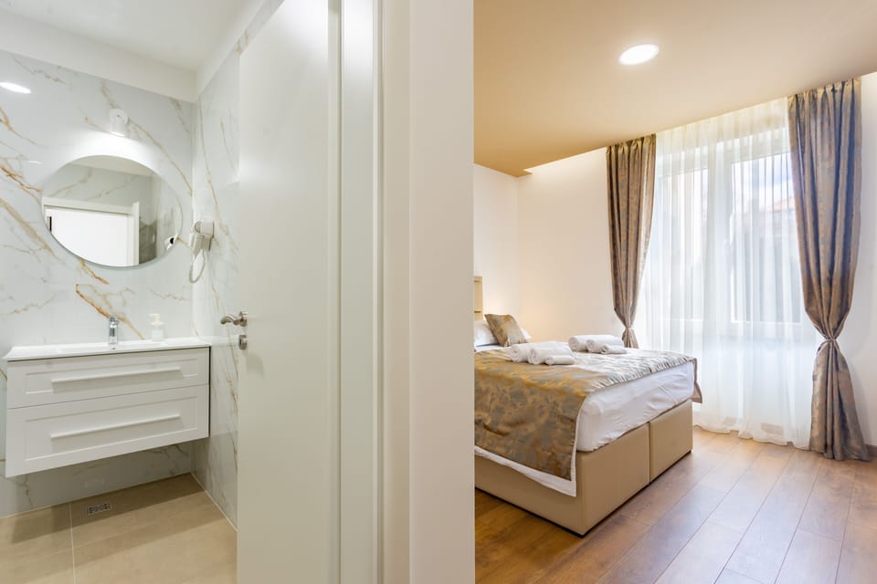 Deluxe Double Room | Frette Italian sheets, premium bedding, memory foam beds, minibar