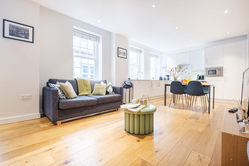 City Apartment, 2 Bedrooms, Non Smoking | Living area | 40-inch Smart TV with cable channels, TV, heated floors