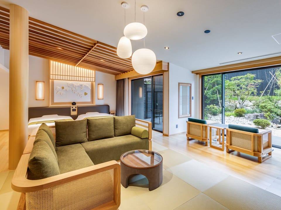 Luxury Suite, Private Bathroom, Garden View | In-room safe, desk, WiFi (free), bed sheets