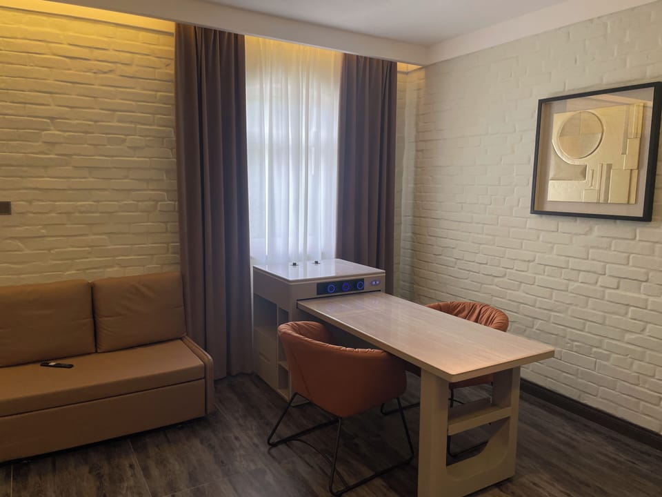 Elite Cabin | Premium bedding, down comforters, minibar, desk