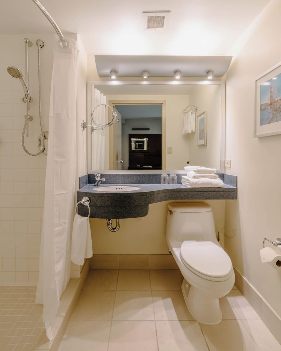 Hair dryer, towels, soap, shampoo