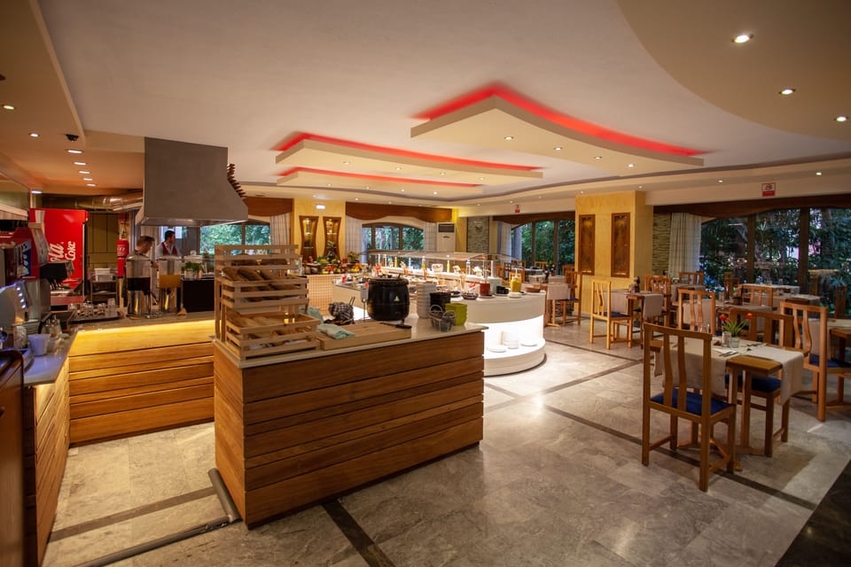 Breakfast, lunch, dinner served; Greek cuisine, garden views 